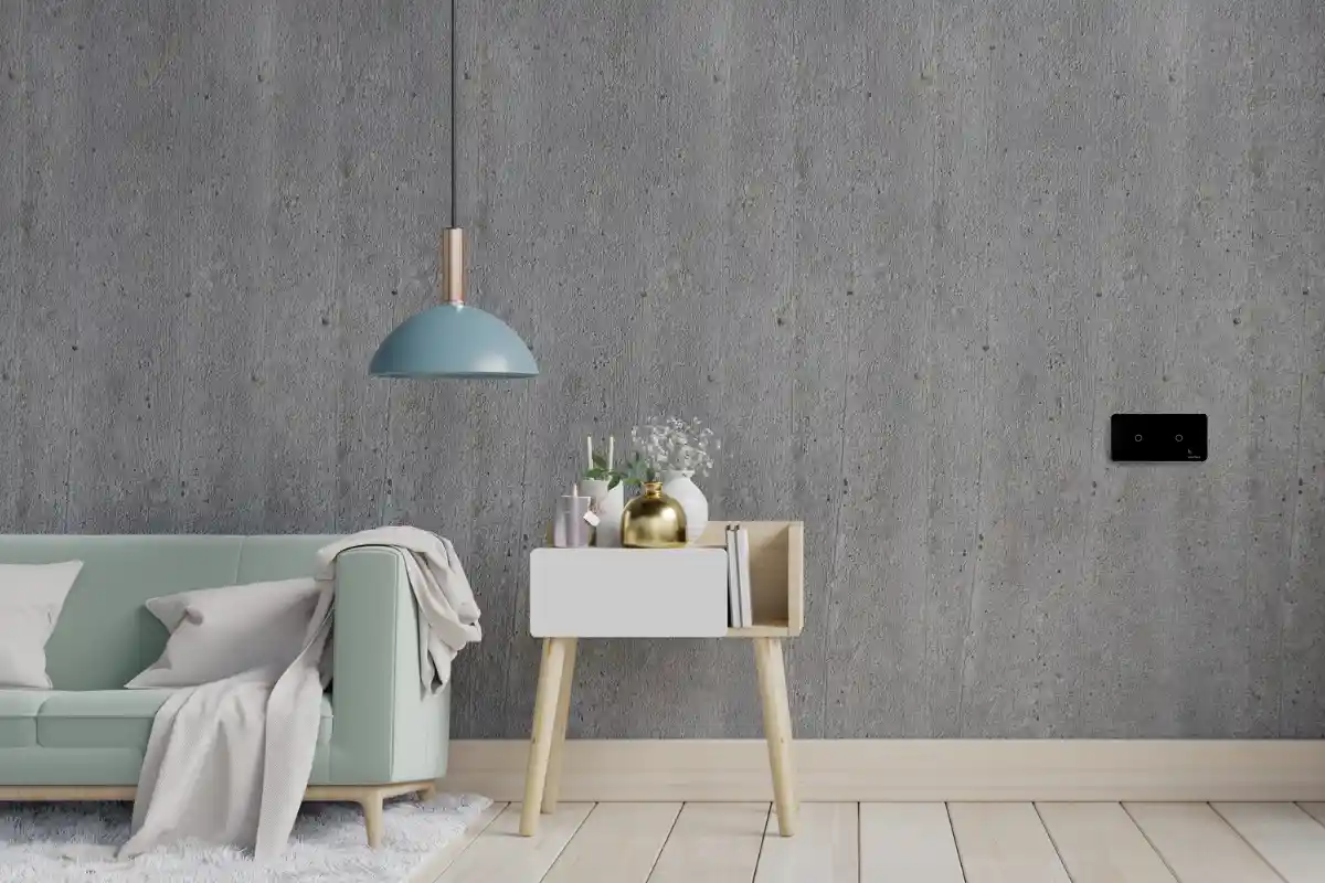 Ramka pozioma pasuje do minimalistycznego, nowoczesnego wystroju wnętrz. Salon z ścianą imitującą beton.